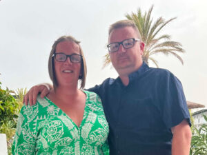 A man and a woman standing close to each other